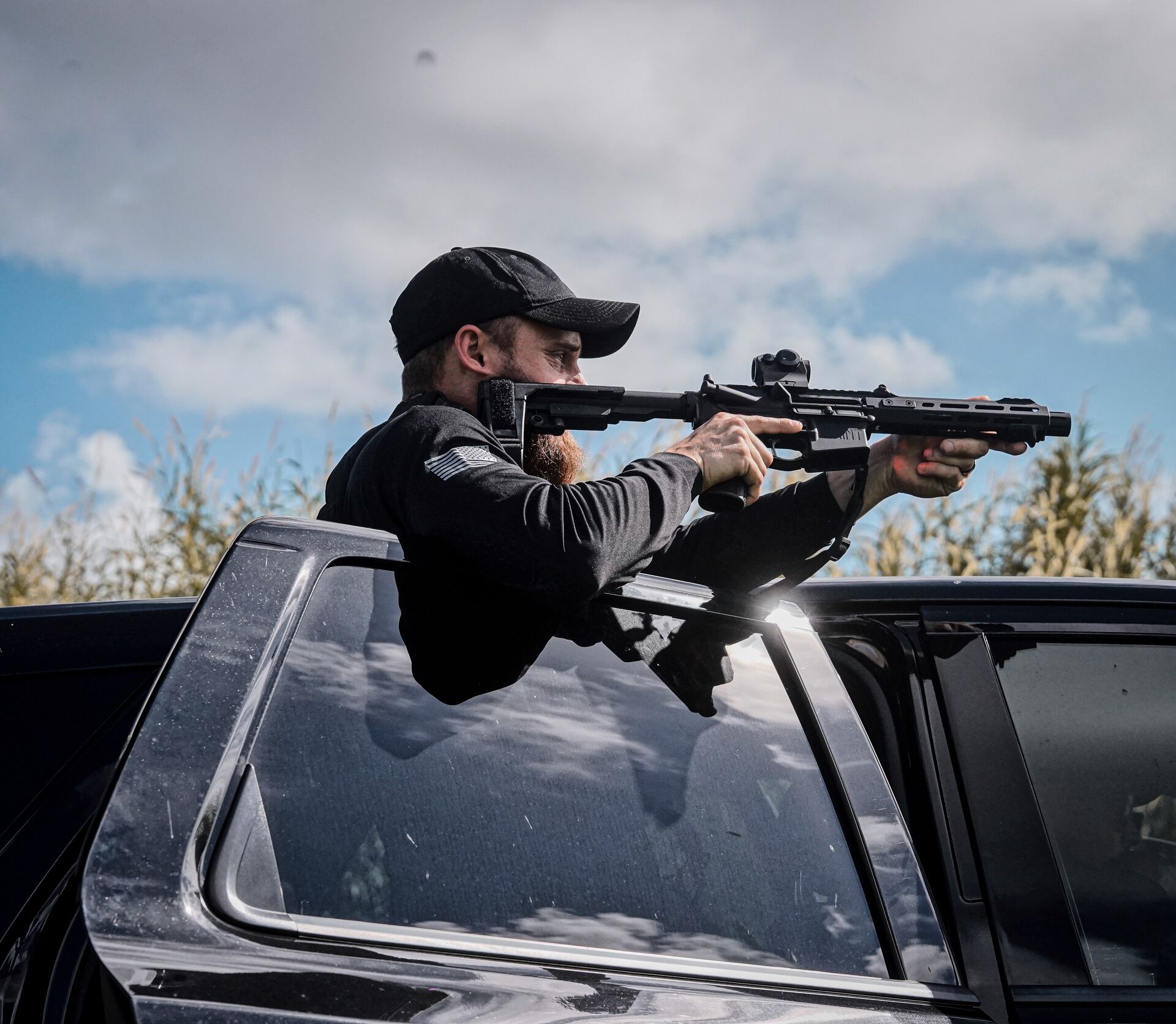 Executive protection training — running a rifle from a vehicle