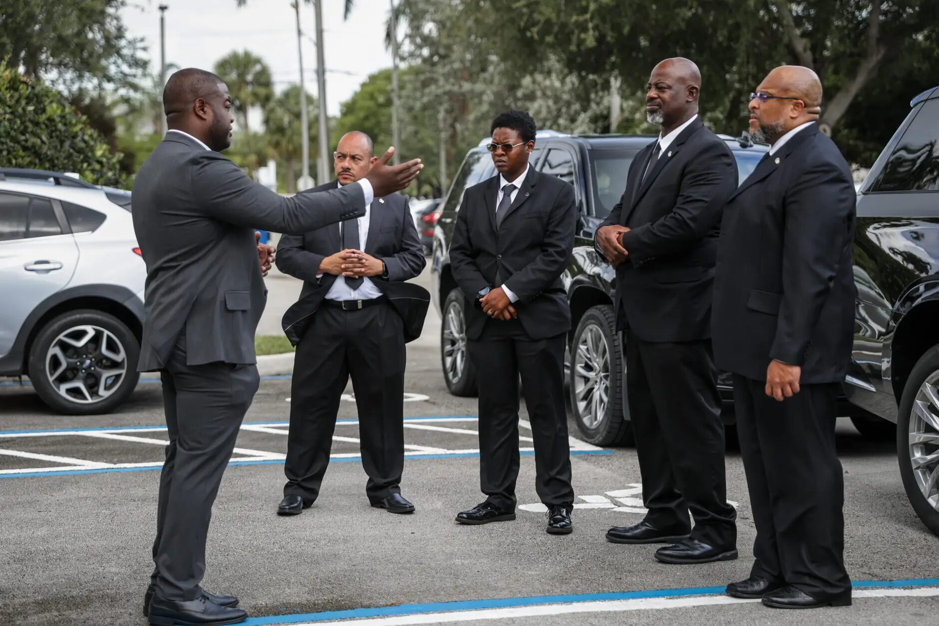 An ARDENT supervisor briefing a team of officers before a shift.